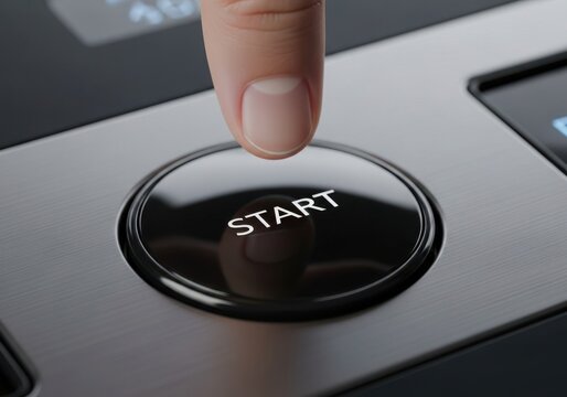 A person s finger is poised and ready to activate a sleek glossy black start stop button inside a contemporary automobile cabin setting