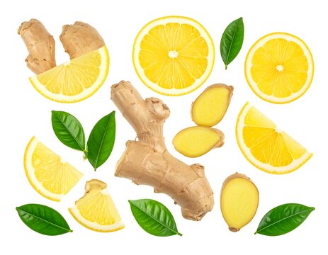 Fresh ginger root pieces, vibrant yellow lemon slices, and green leaves isolated on a white background, ideal for food and wellness design projects.