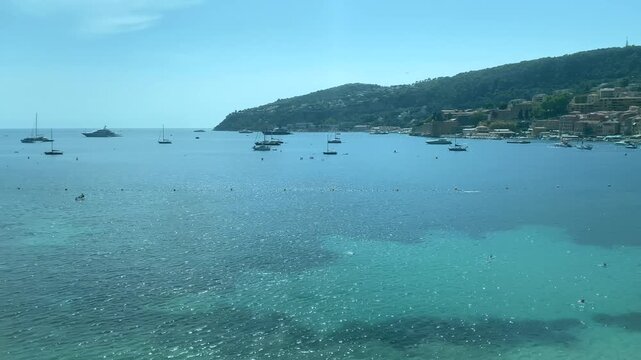 View from a moving train of the sea in Monaco cityscape, Monte Carlo.