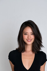 Fototapeta premium beautiful young chinese woman smiling in full body portrait, elegant chinese woman with cute makeup on white background, attractive young asian woman with curvy figure posing in studio