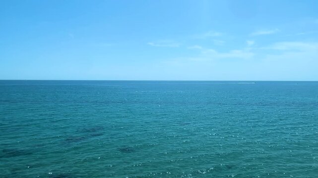 View from a moving train of the Mediterranean Sea near Nice, Cote d'Azur, southern France