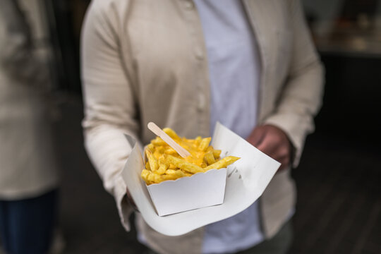Close up of traditional Belgian fries with sauce to go