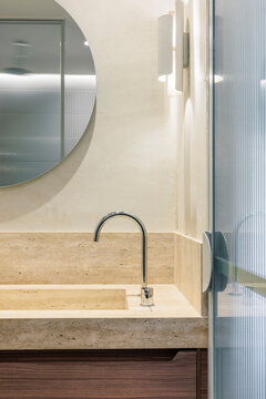 Travertine vanity with chrome tap