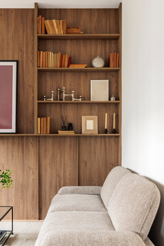Built in wooden bookcase and sofa