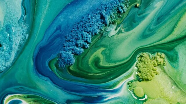 Abstract fluid art background with swirling patterns in shades of blue and green, mixed media