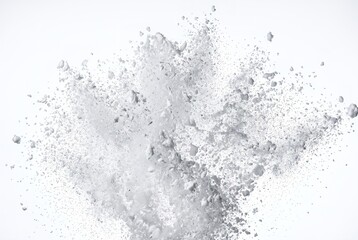 Fototapeta premium A burst of white particles creating a festive Christmas feel. The scene shows a collection of various shapes exploding in a white space. This draws attention to the holiday spirit