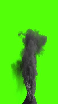 Volcanic eruption spewing black smoke plume on a green screen