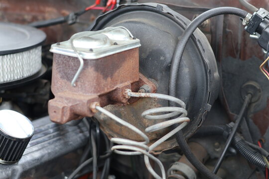 Close-up of V8 Car Engine with Round Air Cleaner and Alternator