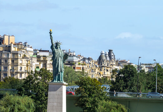 Statue of Liberty located on Swan Island along Seine river in Paris France