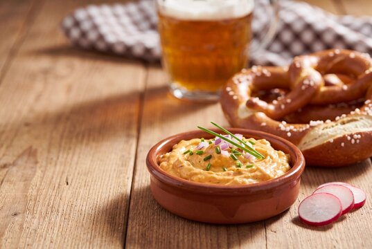 Bavarian Obatzda Cheese Spread with Pretzels, Radishes and Beer