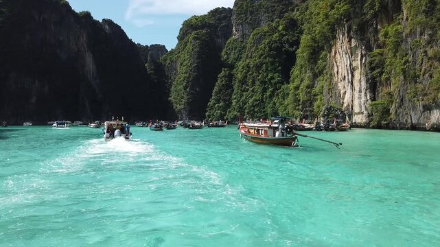 Traditional Longtail Boats in Turquoise Water at Phi Phi Islands, Thailand