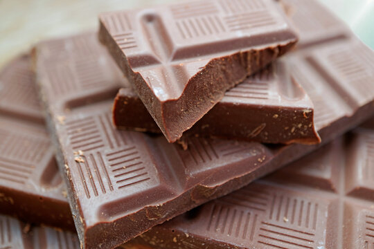 Close-up of dark chocolate chunks, premium culinary ingredient for baking and ganache