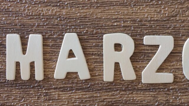 wooden letters spelling out the month of March
