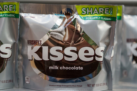 Hershey's Kisses milk chocolate bags on display in a grocery store