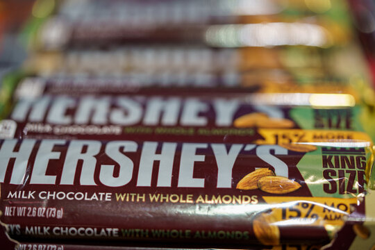 Hershey's chocolate bars with almonds displayed in a store