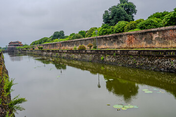 Fototapeta premium Moat and fortress walls of the Imperial City in Hue