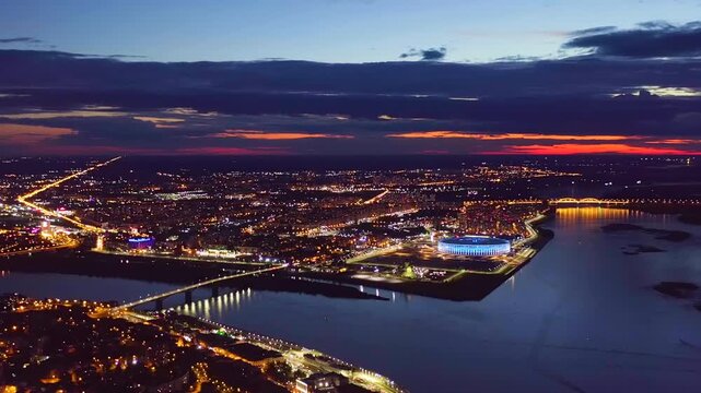 Nizhny Novgorod, Russia. Drone footage of the arrow of the confluence of the rivers. Stadium. Night time. Drone footage