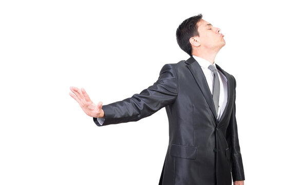 Displeased male in formal suit gesticulating stop gesture and turning away with dissatisfaction