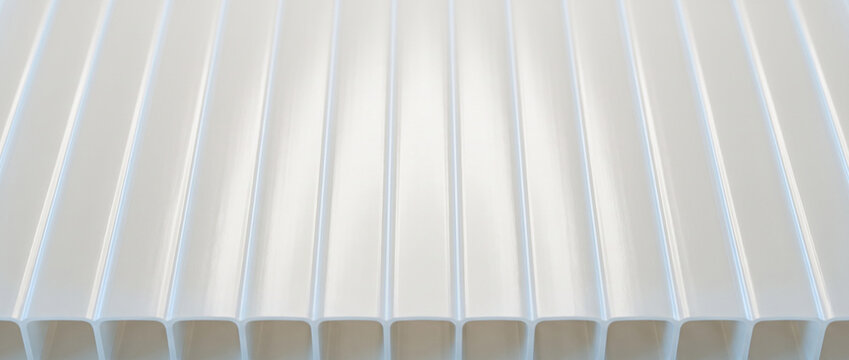 Ribbed corrugated plastic sheet texture in smooth white finish  