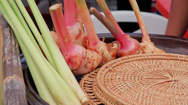 Fruits, vegetables and herbs in the basket. Lemongrass and Galangal.