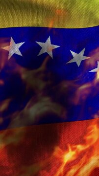 Venezuelan black flag waving burning, with the smoke and fire visible