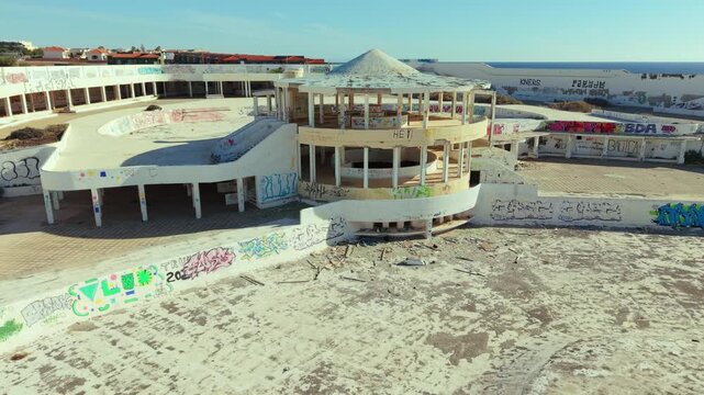 Aerial view of Caleta de Fuste, a resort town on Fuerteventura, one of Spain&rsquo;s Canary Islands, Spain. Drone POV exploration of the abandoned water park at Costa De Antigua.