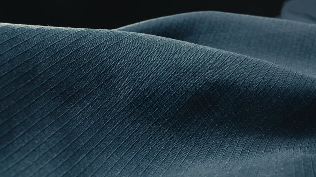 Fabric waterproof jacket hiking close up rain drops texture outdoor material macro detail
