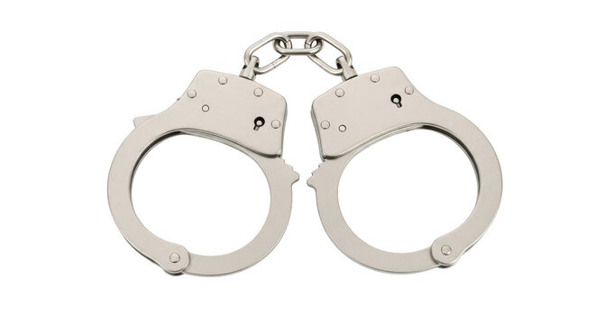 Metal handcuffs connected by chain