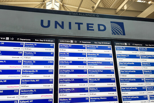A video board show flight departures, delays and cancellations for United Airlines at O'Hare International Airport in Rosemont, Illinois on September 12, 2026.