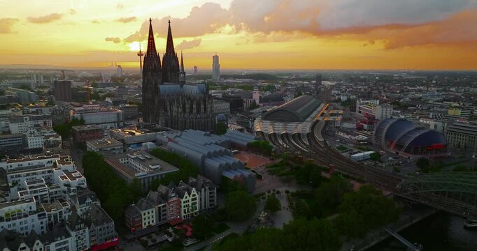 Aerial view of the city of Cologne, featuring Cologne Cathedral at a beautiful sunset