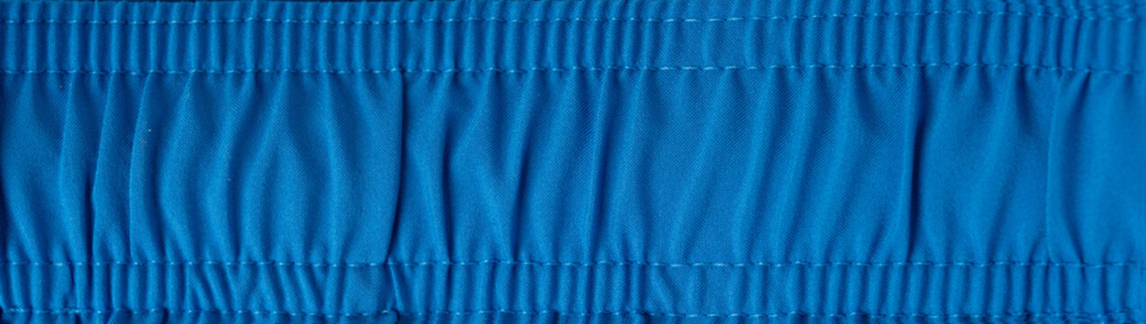 Sport cloth fabric texture background, blue soccer shirt pattern