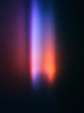 Abstract digital art piece with a dark background. the focal point of the image is a bright orange and blue light that appears to be glowing in the center.