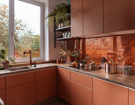 modern kitchen with warm terracotta tiles and copper fixtures blending functionality with a rustic charm interior design warm tones elegance