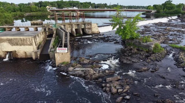 Howland, Maine dam dronie shot on a calm spring morning 