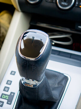 Close Up of Automatic Gear Shift Lever inside Modern Car Cabin