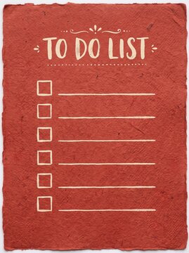 Red textured paper to do list with blank checklist lines and copy space