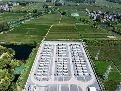 aerial view of energy storage power station in green farmland