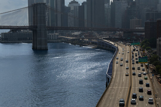 A view from Manhattan Bridge with Brooklyn Bridge, FDR Drive and Manhattan downtown. New York, USA.