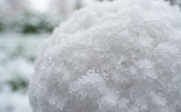 Macro close up of melting snow texture in winter season representing cold weather climate change and seasonal abstract background