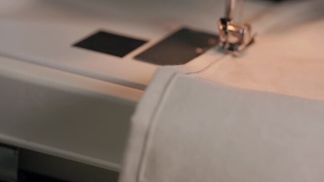 Sewing a simple stitching line on natural linen fabric