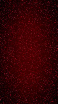 Abstract dark red background with glowing glitter particles moving slowly in digital space for artistic video production and creative visual effects motion graphic design.