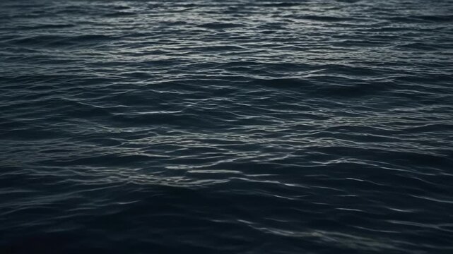 Dark Blue Ocean Sea Surface with Gentle Wave Water Texture Creating Calm Moody Marine Background and Tranquil Natural Pattern for Coastal Design, Reflection Imagery and Minimalist Atmosphere
