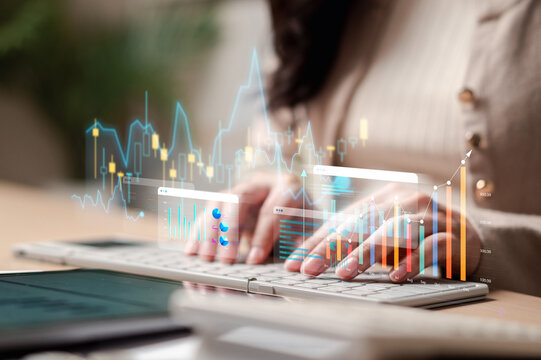 Finance business investment data analysis and stock market trading. Woman hands typing on computer keyboard with chart graph.
