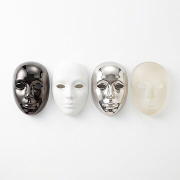 Four elegant masks of varying materials and finishes are artfully arranged in a minimalist composition, each representing a unique facet of identity.