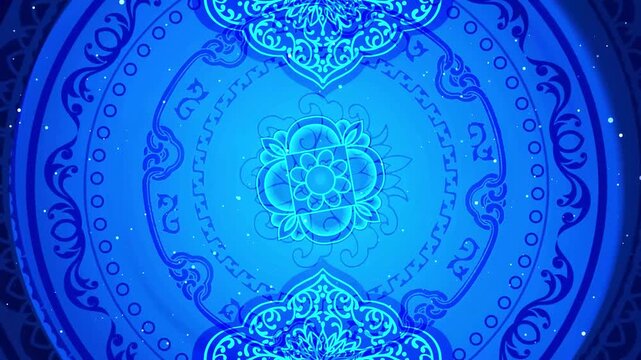 Blue ornamental mandala pattern with glowing floral motifs and concentric decorative borders, animated with subtle shimmering particles