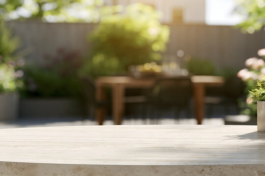 Empty Light Stone Tabletop with Blurred Garden Terrace Background