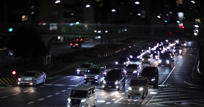 A night miniature cityscape of traffic jam at the urban street in Kyoto in winter