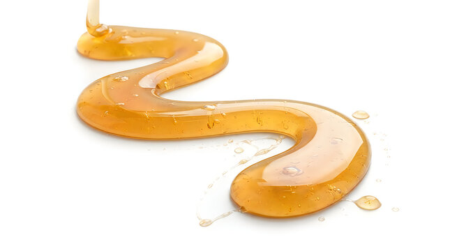 Golden syrup dripping on clean surface