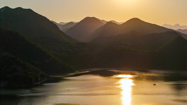 Sunset Reflection Over Lake Skadar and Montenegro Mountains