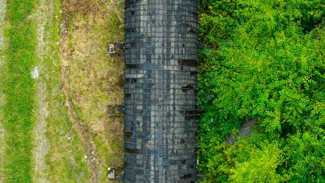 Summer aerial view featuring the 3.4 mile long wooden penstock in Vermont known as The Snake that runs from the Searsburg Dam to a generating station along the Deerfield River with an 8 foot diameter